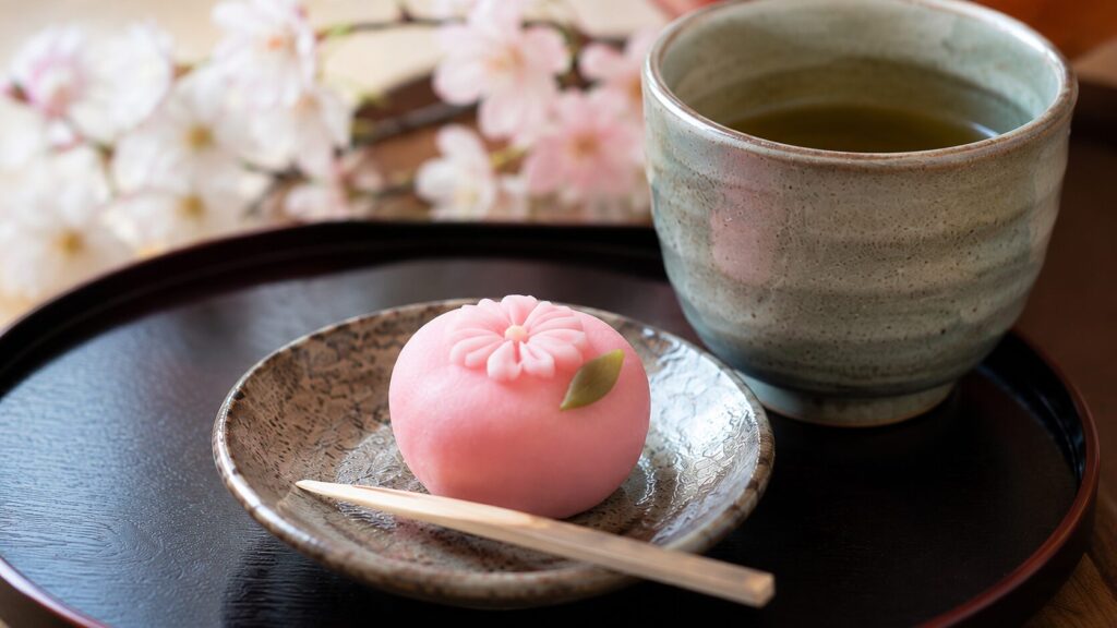 和菓子と温かいお茶を組み合わせた上品な和風の結婚式向け引き菓子